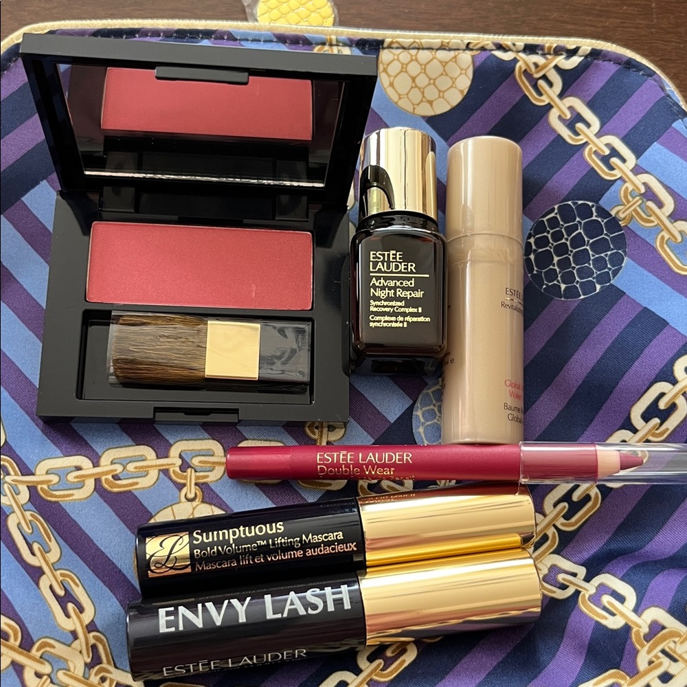 NWOT Estee Lauder Makeup Collection with bag, blush,2serums, lip pencil